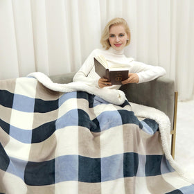 Gracelife double-sided plush blanket displayed on bed for versatile warmth.