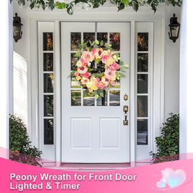 Grandeal silk leaves accent the wreath for lush greenery year-round.