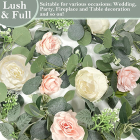 Grandeal garland as a table runner centerpiece with soft blooms