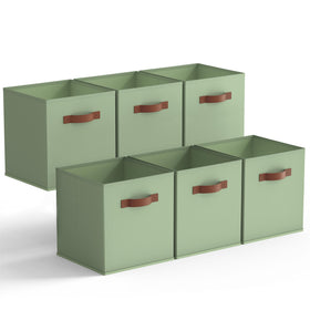 Granny Says sage green storage cubes on a shelf, enhancing tidy organization