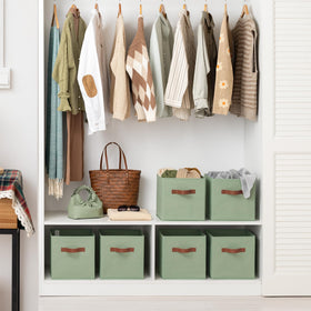 GRANNY SAYS foldable cube storage bin with base plate shown in use.
