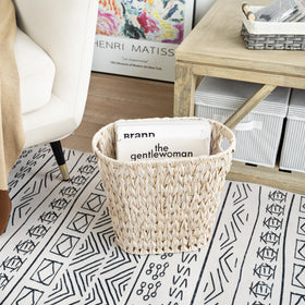 GRANNY SAYS handwoven farmhouse trash can adds rustic charm to any room.