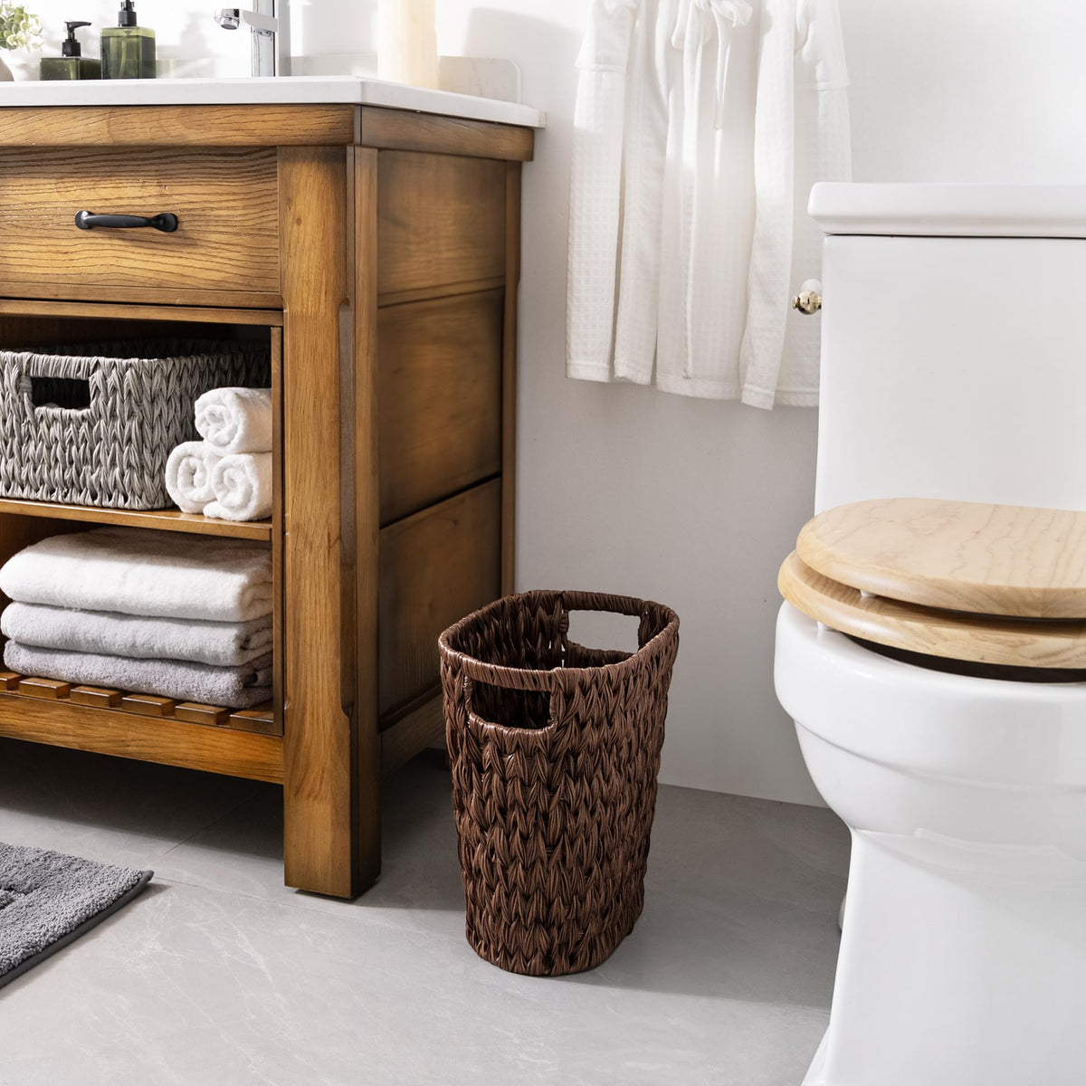 GRANNY SAYS waste basket with side handles for portable use.