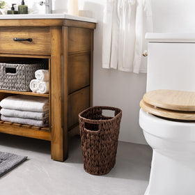 GRANNY SAYS waste basket with side handles for portable use.