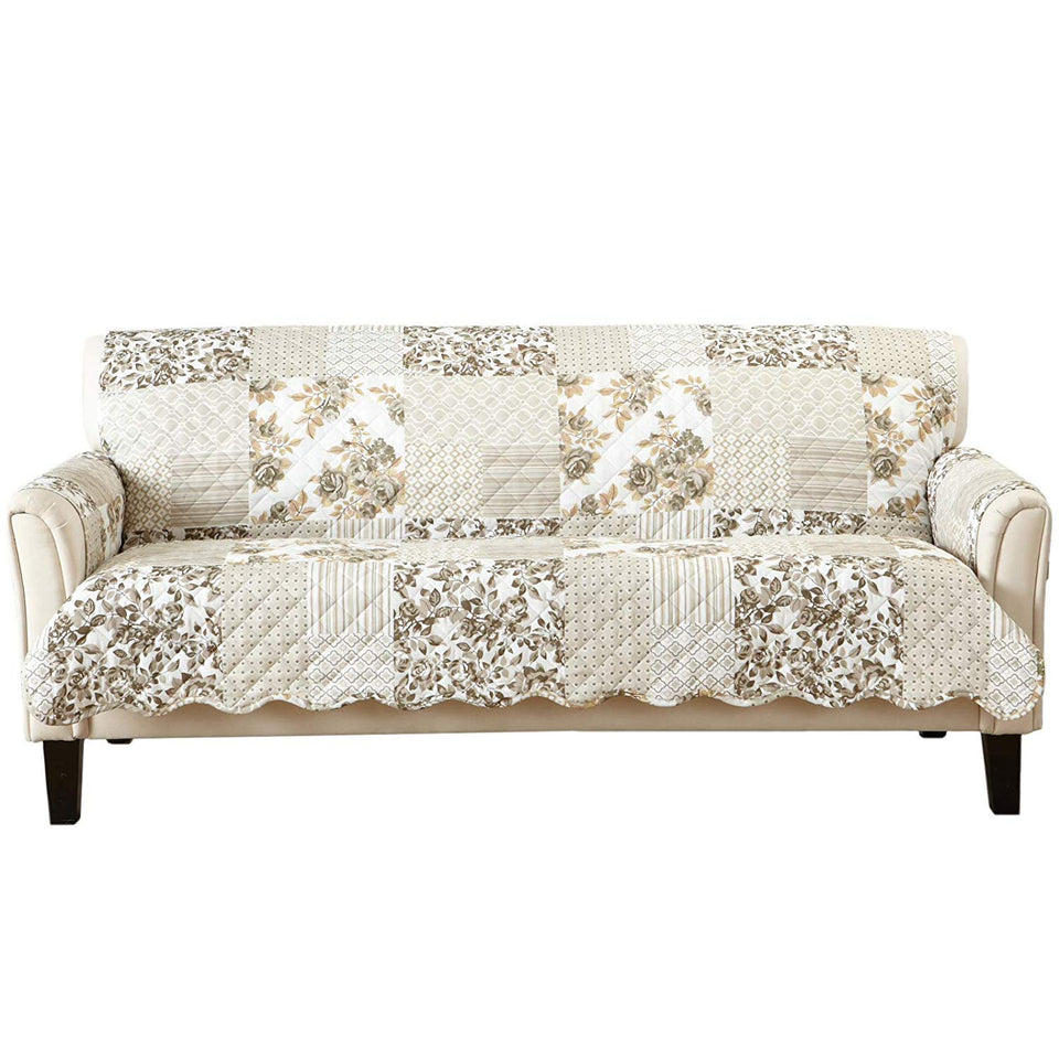 Great Bay Home patchwork sofa cover in taupe with box-stitch detail protects furniture