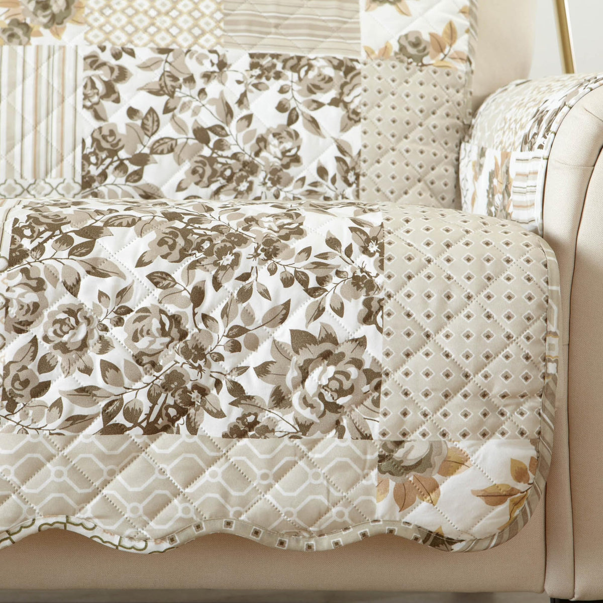Great Bay Home slipcover with elastic straps keeps recliner in place.