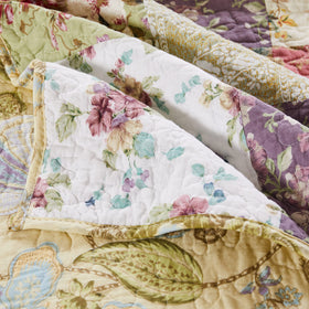 Reverse Jacobean print on soft yellow ground of the throw