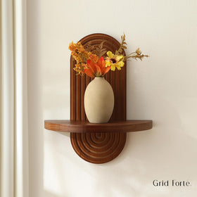 GRID FORTE walnut finish shelves elevate space for plants, photos, and keepsakes.