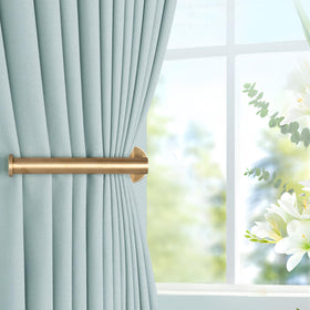 Groleca gold adhesive holdbacks used as towel hook option for convenience.