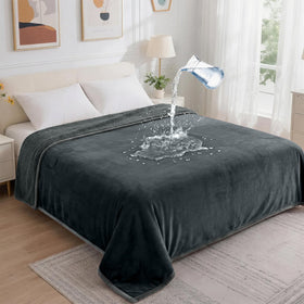 GROOSE waterproof blanket fabric closeup shows soft flannel and protective layers.