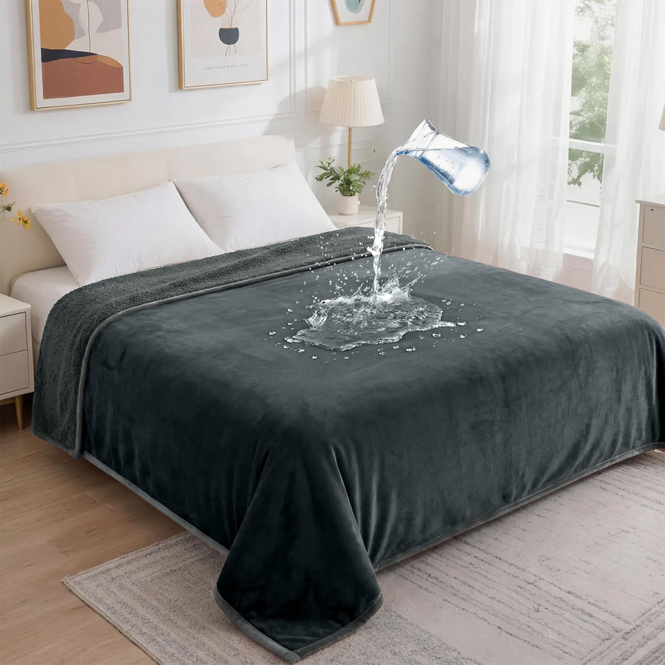 GROOSE waterproof blanket fabric closeup shows soft flannel and protective layers.