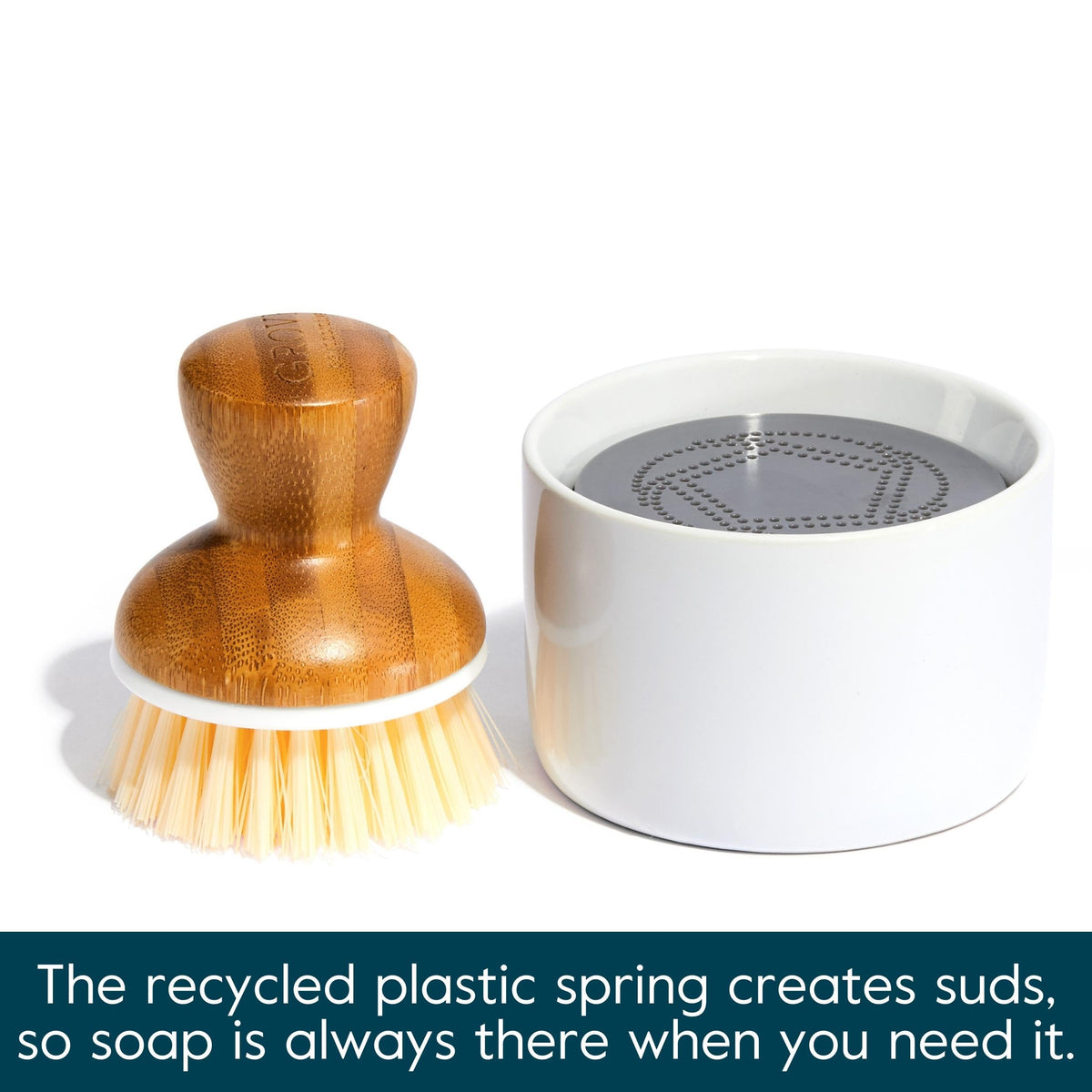 Grove Co Bubble-Up ceramic base neatly stores the brush after use.