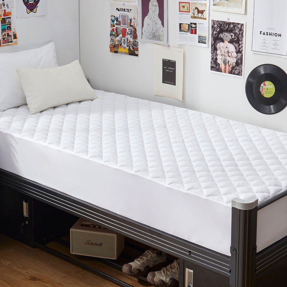 GRT Twin XL waterproof mattress pad showing waterproof membrane protects against spills