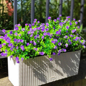 Grunyia weather-ready artificial flowers in purple for garden borders.