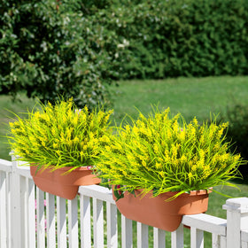 Lifelike color tones from Grunyia create natural yard accents outdoors.