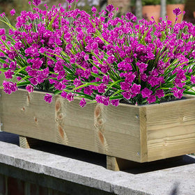 Grunyia lifelike artificial flowers suitable for indoor and outdoor use.