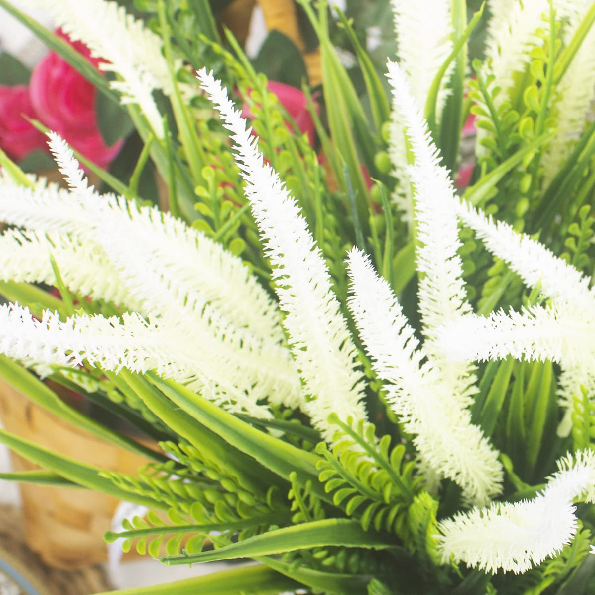 Grunyia window box arrangement with realistic greenery for curb appeal.