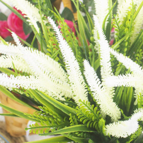 Grunyia window box arrangement with realistic greenery for curb appeal.