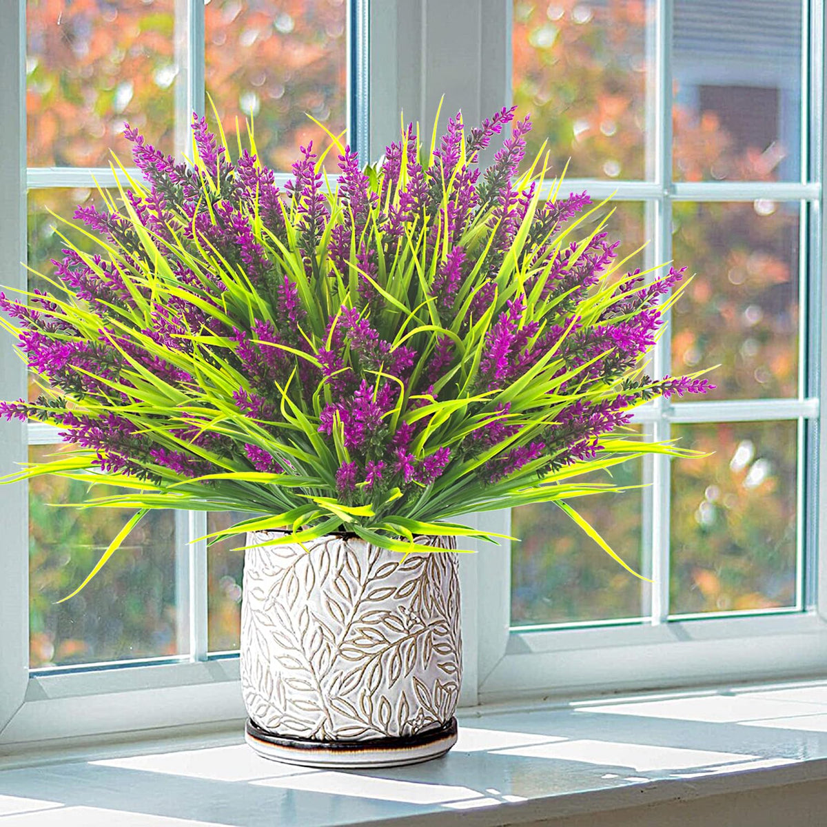 Grunyia fuchsia flowers arrangement; lush, enduring color for outdoor displays