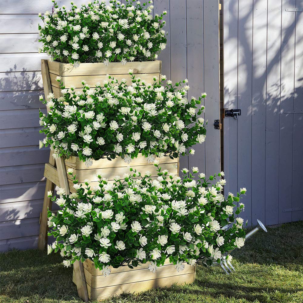 Grunyia artificial shrub with seven stems adds lush greenery to gardens and entryways