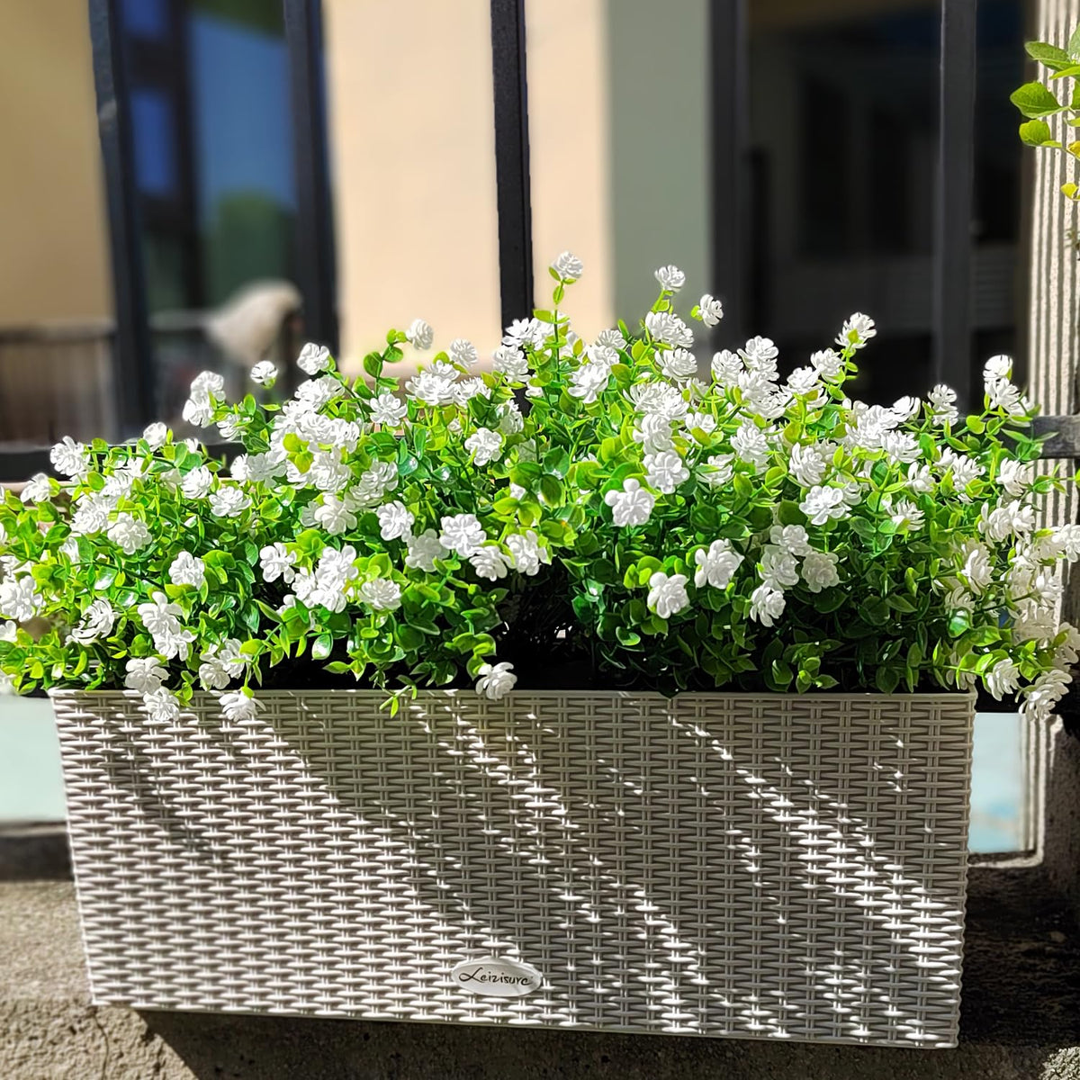 Grunyia hanging planter decor with lush faux flowers