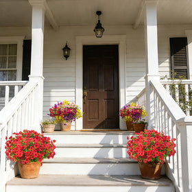 Grunyia outdoor artificial flowers arranged in hanging planters for porch decor.