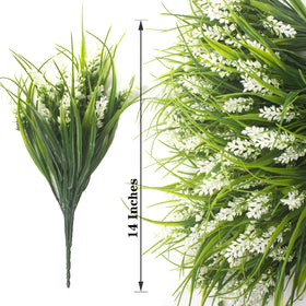 Grunyia faux plants show realistic blooms and blades for weddings and events.