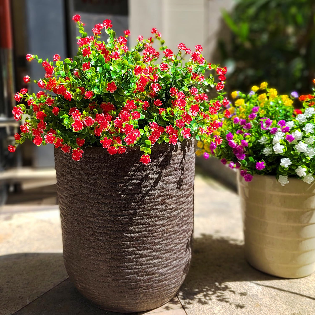 Grunyia red faux flowers for window boxes add curb appeal
