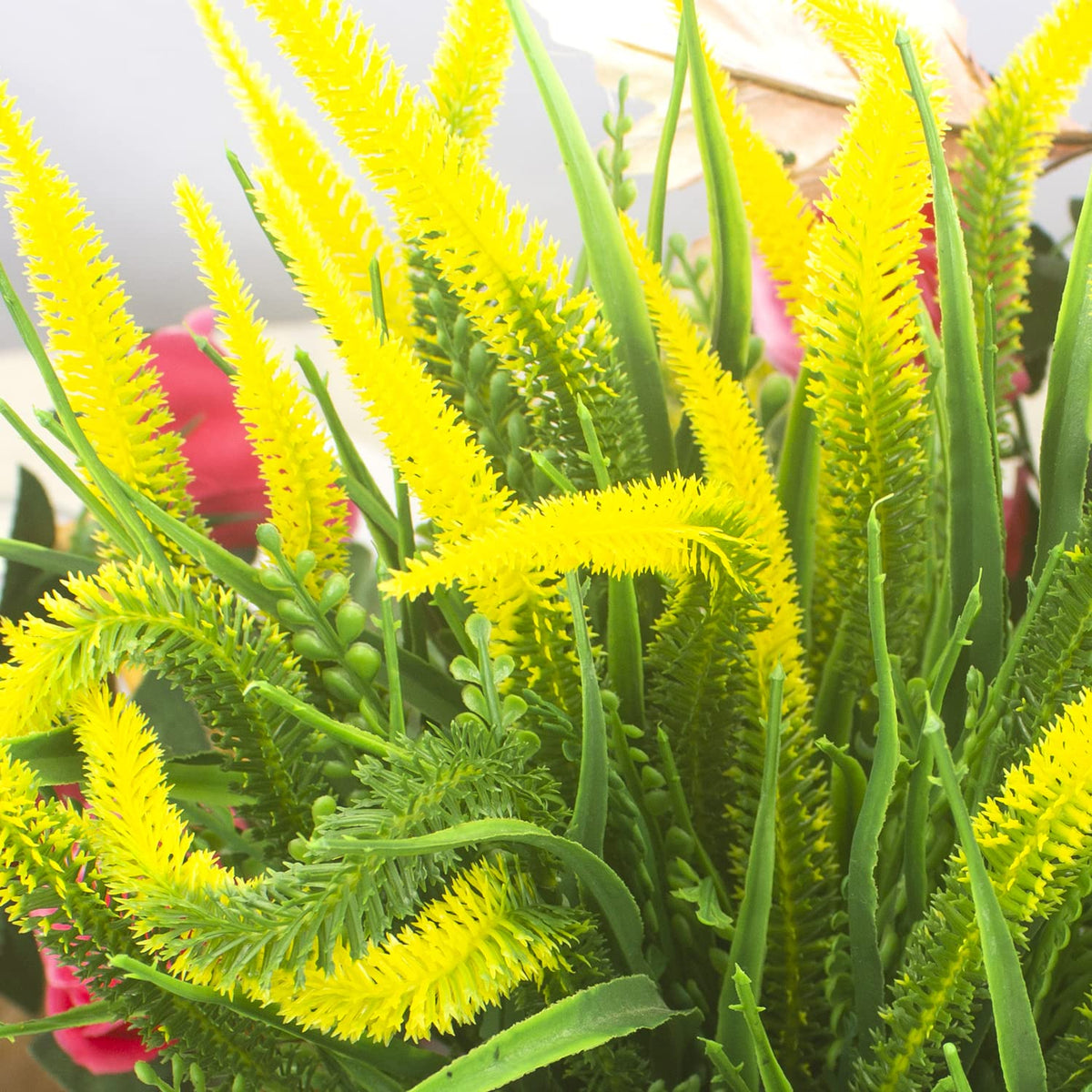 Grunyia wedding or hotel decor uses artificial plants for lasting appeal.