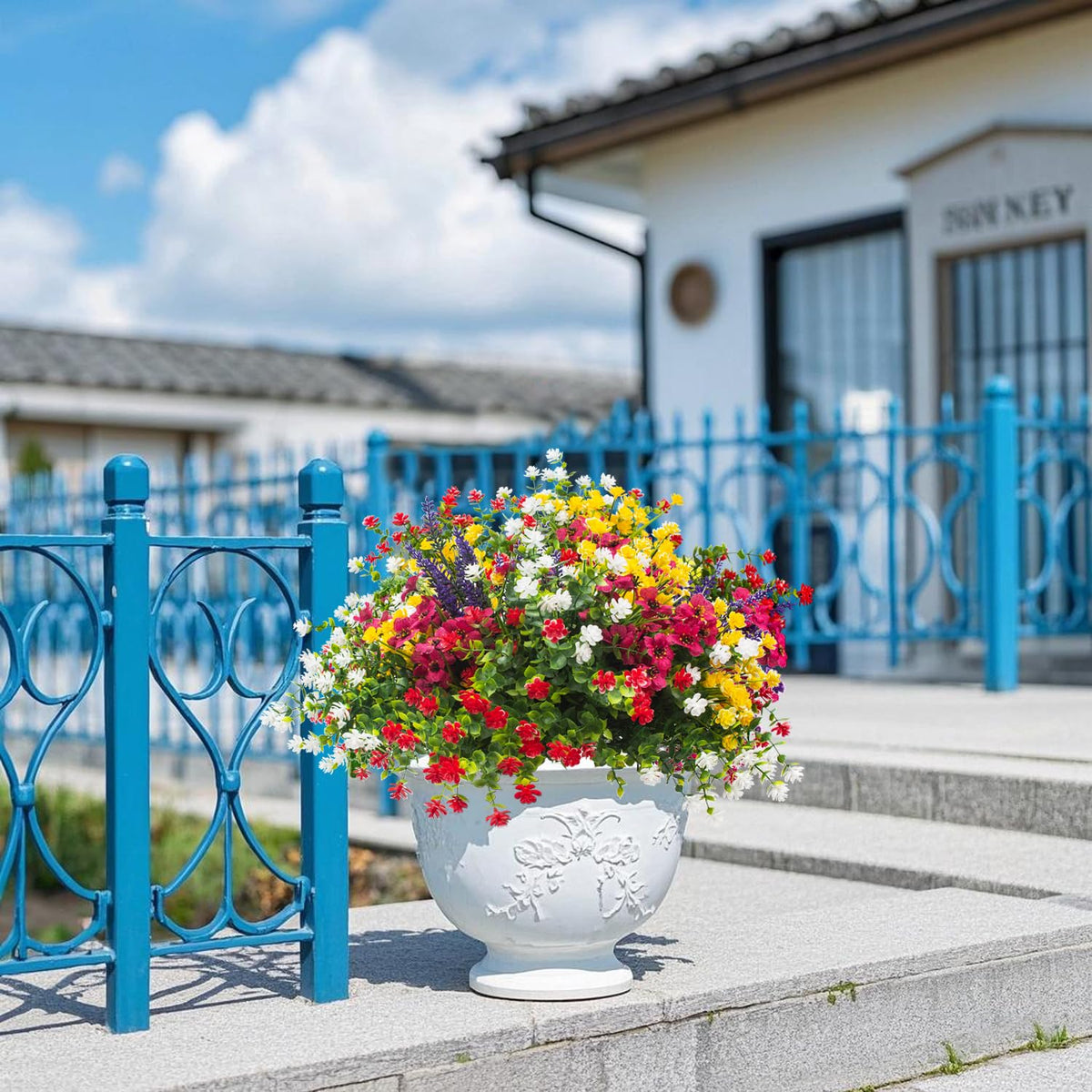 Grunyia window box setup showcases vibrant blooms for indoor/outdoor charm.