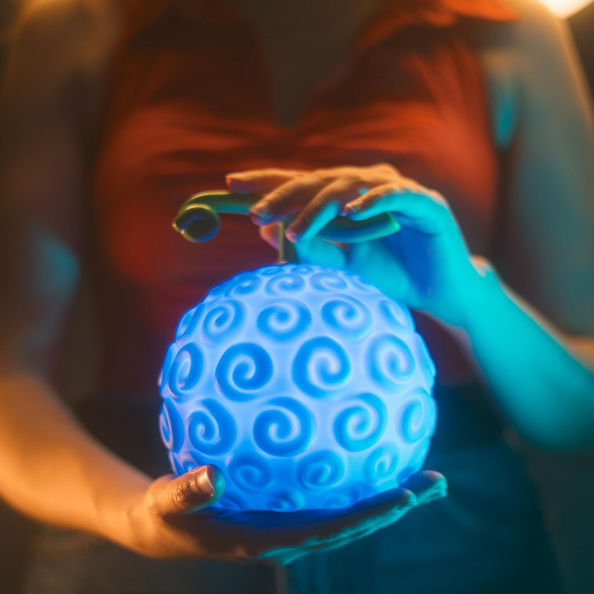 Grupo Erik Gomu Gomu no Mi lamp provides ambient blue and white light for fans.