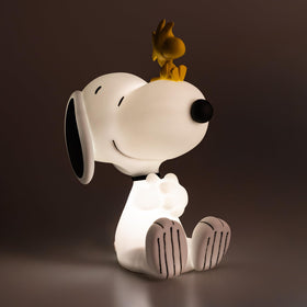Grupo Erik Snoopy lamp desk-setup adds warm, focused light for study.