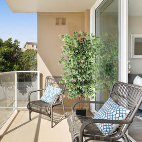 GTIDEA living room decor ficus tree provides height and lush greenery.