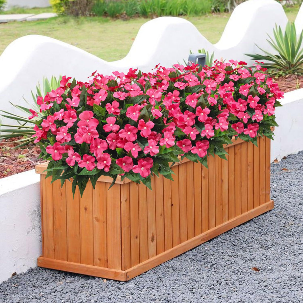 Guagb outdoor impatiens rose red assembly closeup shows stems.
