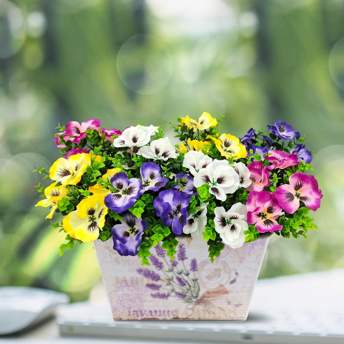 Guagb silk and plastic leaves create lifelike faux display for outdoor decor.