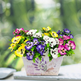 Guagb silk and plastic leaves create lifelike faux display for outdoor decor.
