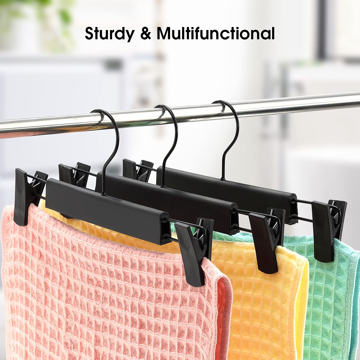 GUANJUNE versatile hangers hold skirts and towels.