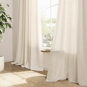 Light filtering linen fabric softens sunlight while preserving a view