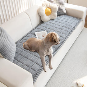 Gumfolk Pet Couch Cover gray on sofa protects upholstery from pet mess.