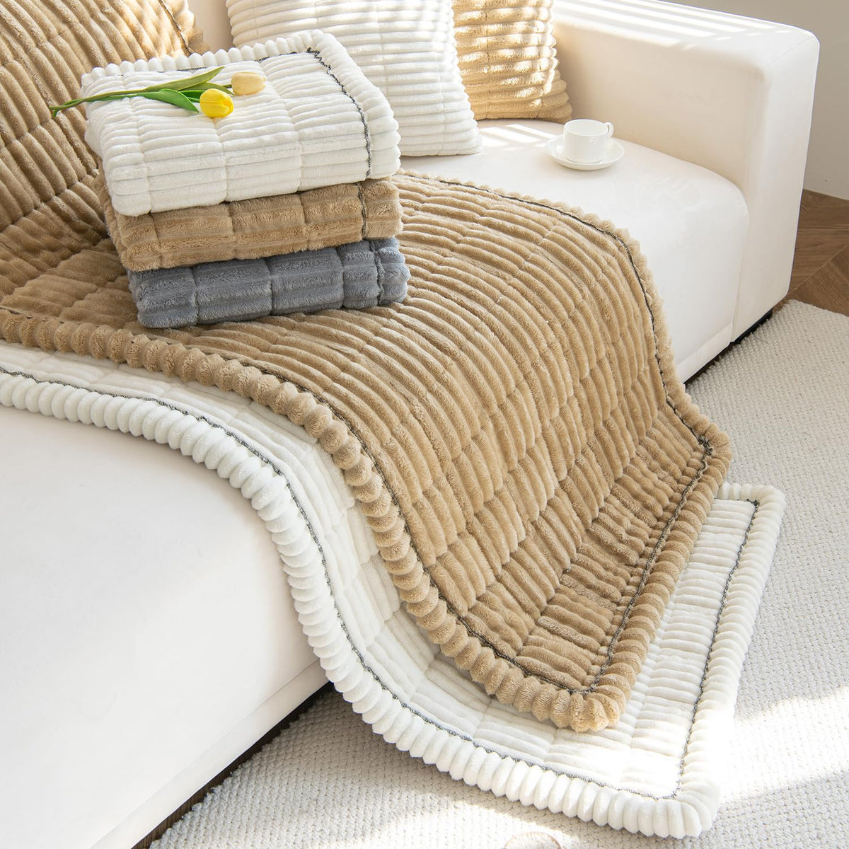 Gumfolk on a sofa in soft neutral color options for versatile home decor.