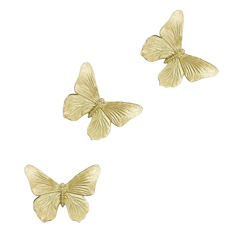 GUSFREUD 3D butterfly wall decor set in antique gold elevates living rooms with vintage charm.