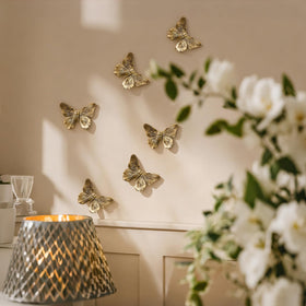 GUSFREUD bedroom decor with antique copper butterfly wall art