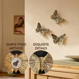 GUSFREUD living room display featuring three butterfly wall decors