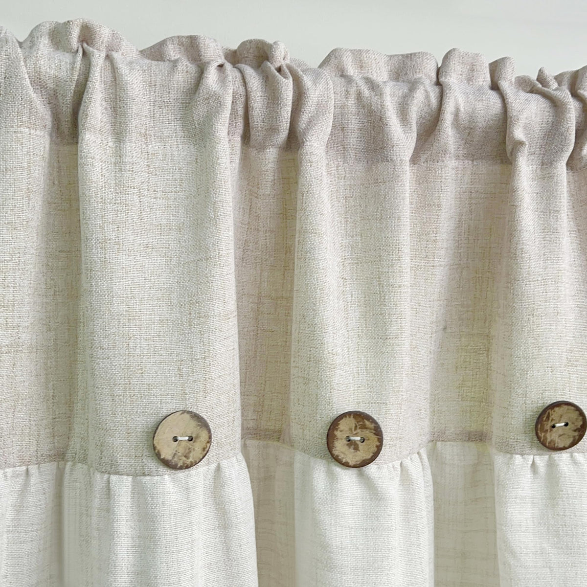 Gxi beige linen curtain swag highlighting wooden button detail
