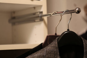 H. Bowes closet valet rod wall-mount view for easy organization.