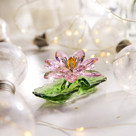 H&D Hyaline & Dora pink sparkle crystal lotus on a shelf catches daylight