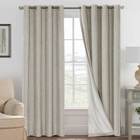 H.VERSAILTEX blackout drapes in textured fabric block light and enhance privacy.