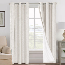 H.VERSAILTEX ivory blackout curtains in two panels for light control.