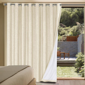 H.VERSAILTEX linen blackout curtain in bleached sand panel blocks light for restful mornings.