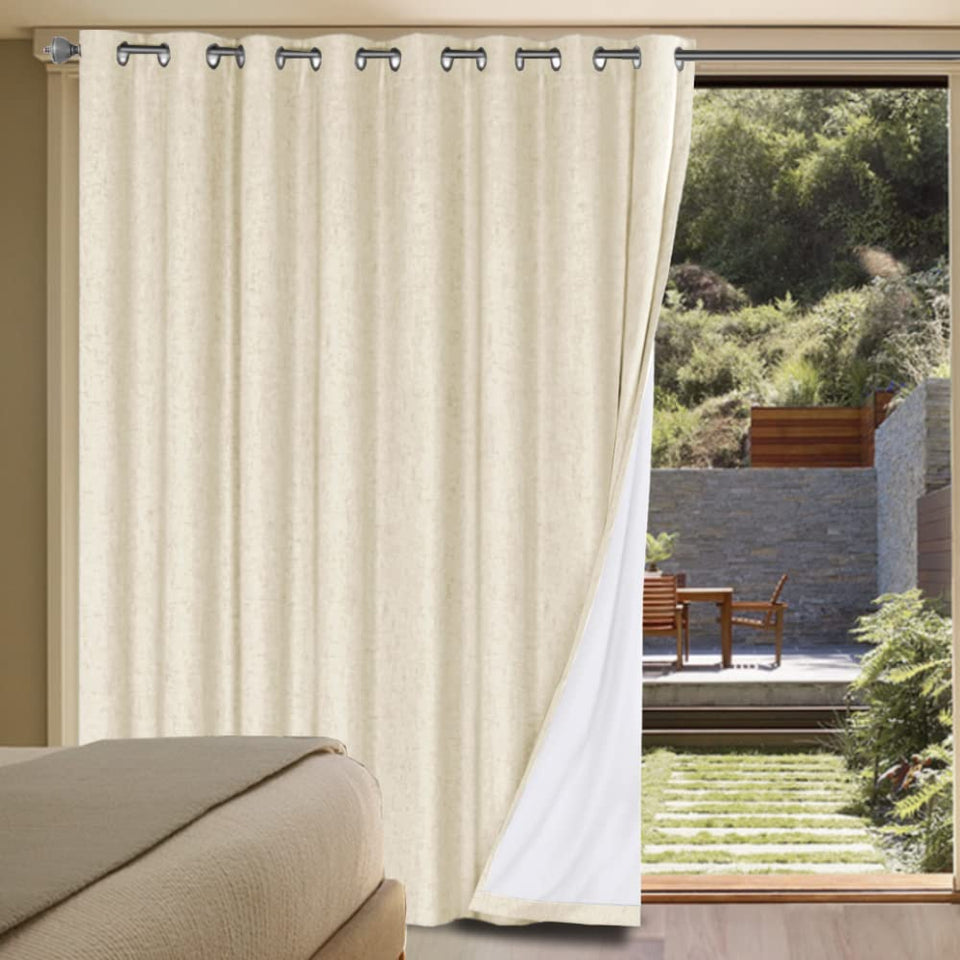 H.VERSAILTEX linen blackout curtain in bleached sand panel blocks light for restful mornings.
